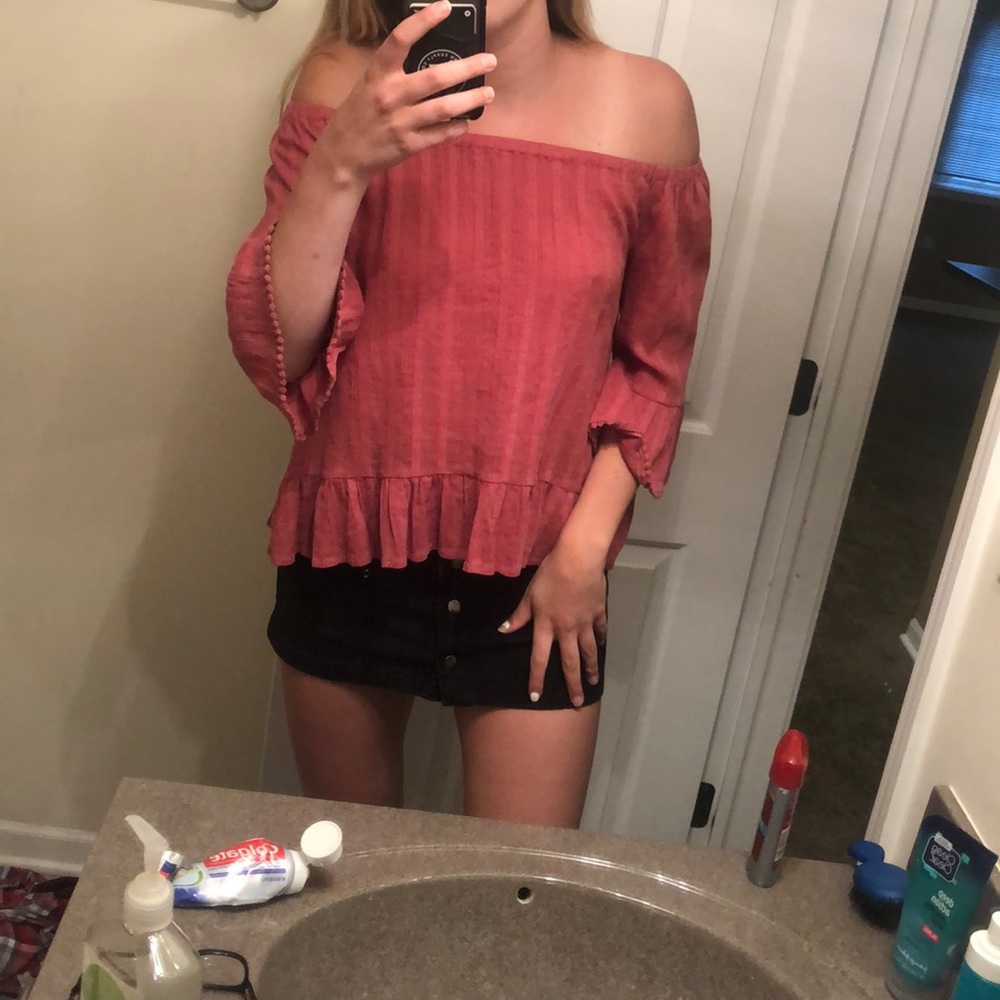 pink off the shoulder shirt